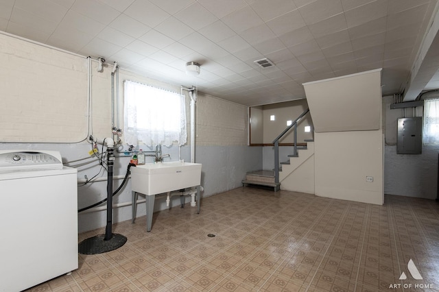 5444 S Kedvale Ave, Chicago, IL 60632 - laundry area featuring washer / dryer, electric panel, healthy amount of natural light, and tile patterned floors
