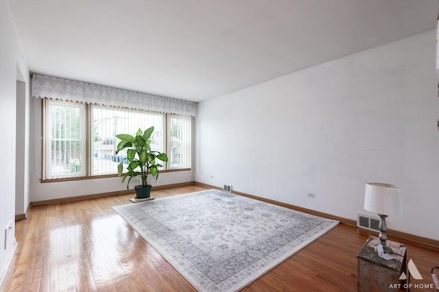 5444 S Kedvale Ave, Chicago, IL 60632 - unfurnished room featuring wood finished floors and baseboards