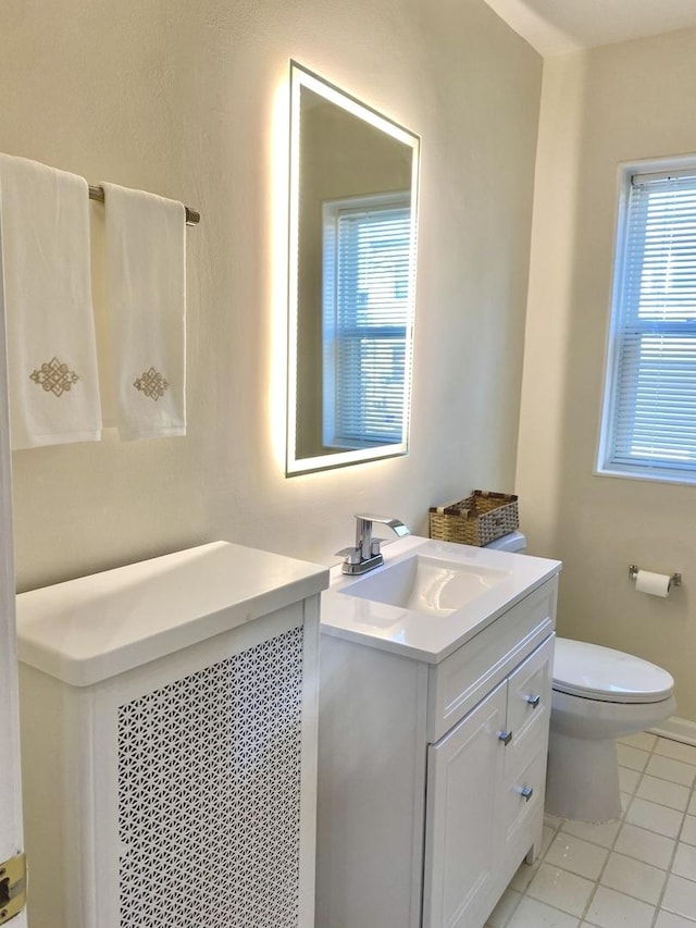 2614 W Lunt Ave, Chicago, IL 60645 - bathroom featuring vanity and tile patterned floors