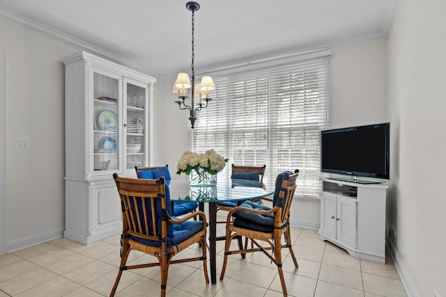 572 Stockbridge Ct, Lake Forest, IL 60045 - dining area featuring a chandelier, light tile patterned flooring, and crown molding
