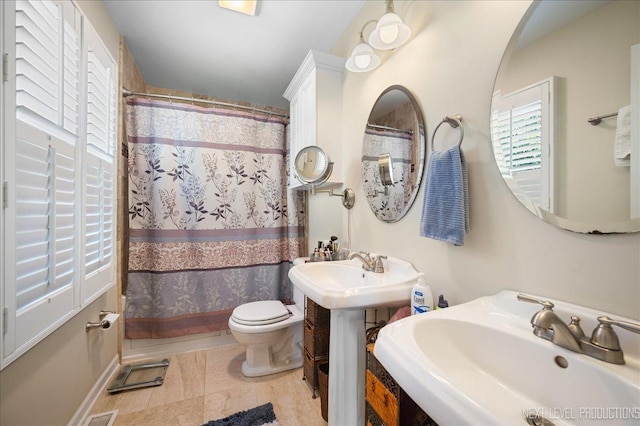 1200 Crestview Dr, Batavia, IL 60510 - full bathroom featuring a sink and toilet