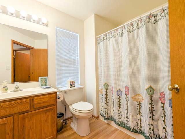 5710 Hearthside Dr, Bourbonnais, IL 60914 - full bath featuring wood finished floors, vanity, and a shower with shower curtain