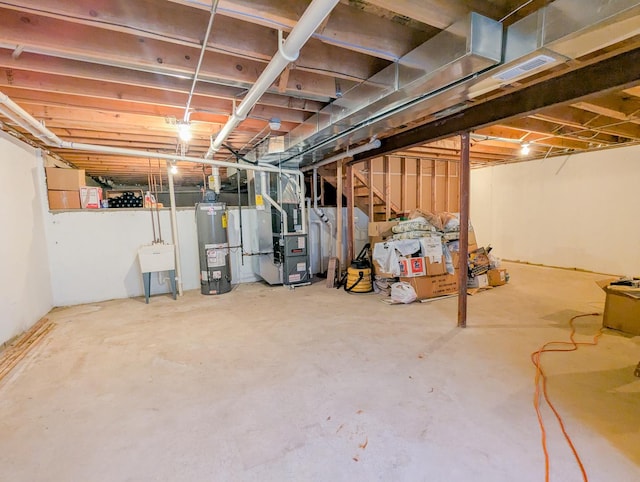 5710 Hearthside Dr, Bourbonnais, IL 60914 - unfinished basement featuring water heater, heating unit, and stairway