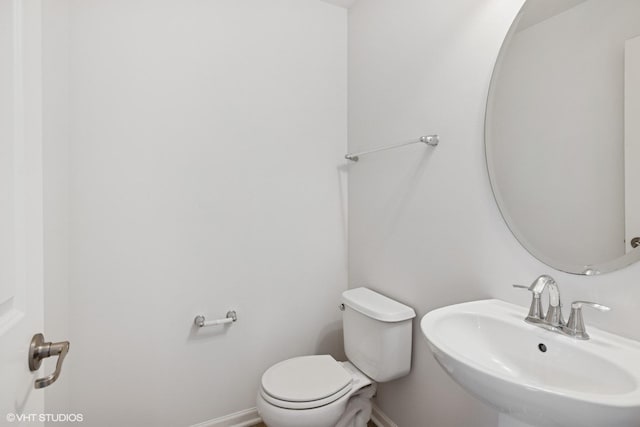 208 W Hyde St, Arlington Heights, IL 60005 - half bath with a sink and baseboards