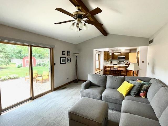 10S305 Havens Dr, Downers Grove, IL 60516 - living room featuring light colored carpet and a ceiling fan
