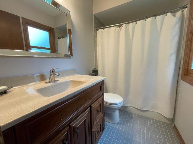 10S305 Havens Dr, Downers Grove, IL 60516 - bathroom with vanity and tile patterned floors