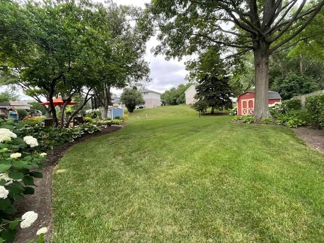 10S305 Havens Dr, Downers Grove, IL 60516 - view of grassy yard featuring a storage unit