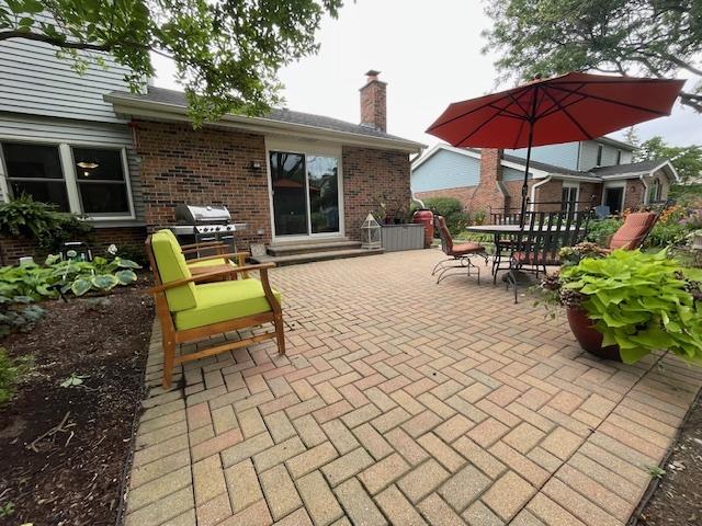 10S305 Havens Dr, Downers Grove, IL 60516 - view of patio / terrace with a grill and outdoor dining space