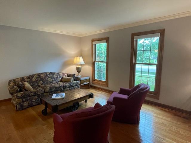 10S305 Havens Dr, Downers Grove, IL 60516 - living room with wood finished floors and crown molding
