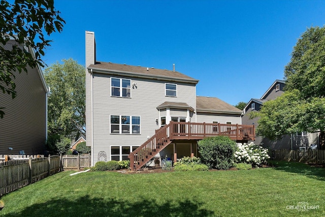 39W183 E Burnham Ln, Geneva, IL 60134 - back of house featuring stairs, a wooden deck, a chimney, and a fenced backyard