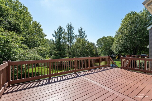 39W183 E Burnham Ln, Geneva, IL 60134 - wooden deck featuring a lawn