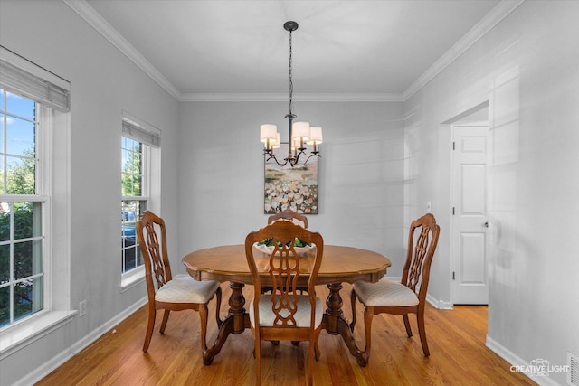 39W183 E Burnham Ln, Geneva, IL 60134 - dining area featuring light wood-style floors, a chandelier, and crown molding