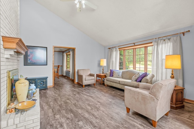 35W186 Duchesne Dr, Dundee, IL 60118 - living room featuring high vaulted ceiling, plenty of natural light, wood finished floors, and a ceiling fan