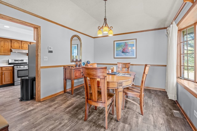 35W186 Duchesne Dr, Dundee, IL 60118 - dining area featuring wood finished floors, crown molding, and vaulted ceiling