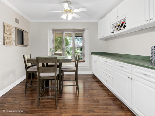8228 W 140th St Unit 8228, Orland Park, IL 60462 - dining space featuring ornamental molding, a ceiling fan, and dark wood-type flooring