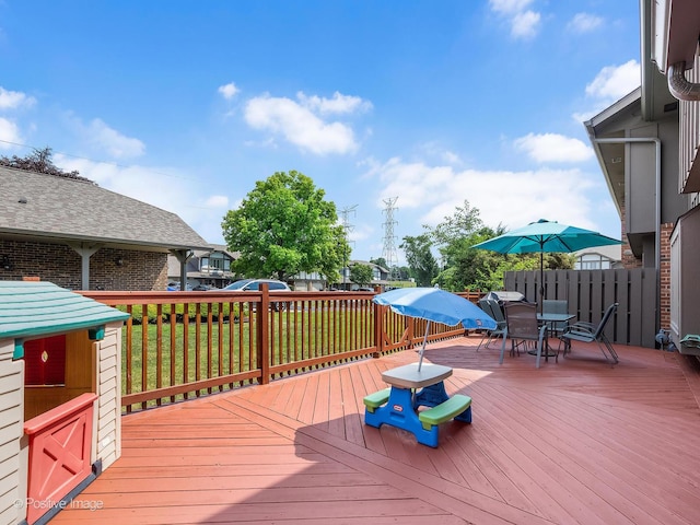 8228 W 140th St Unit 8228, Orland Park, IL 60462 - wooden deck with outdoor dining space and a lawn