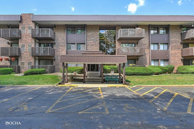 1423 Woodbridge Rd Unit 2C, Joliet, IL 60436 - view of apartment building / complex with uncovered parking