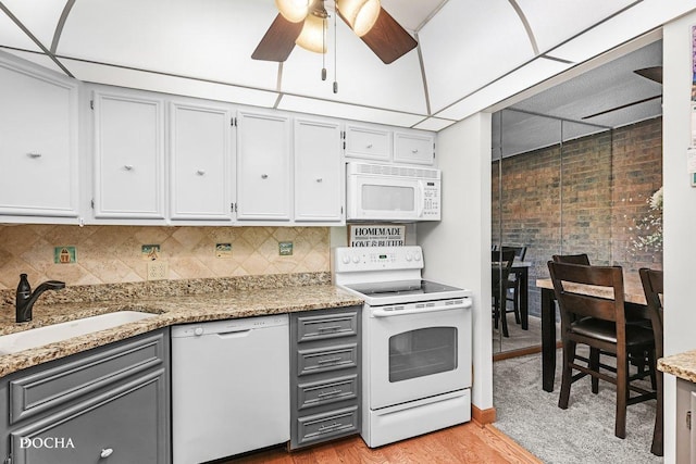 1423 Woodbridge Rd Unit 2C, Joliet, IL 60436 - kitchen with white appliances, gray cabinets, light wood-type flooring, and ceiling fan