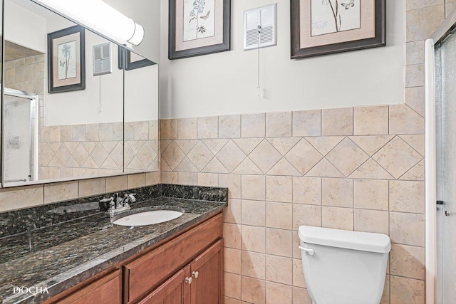 1423 Woodbridge Rd Unit 2C, Joliet, IL 60436 - full bathroom featuring vanity, a stall shower, and tile walls