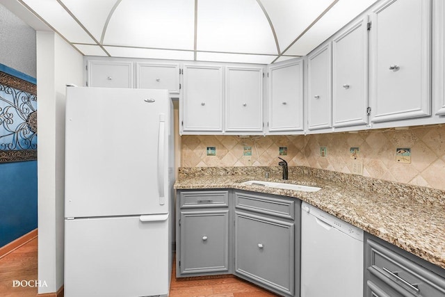 1423 Woodbridge Rd Unit 2C, Joliet, IL 60436 - kitchen with white appliances, gray cabinetry, and backsplash