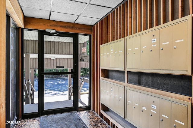 1423 Woodbridge Rd Unit 2C, Joliet, IL 60436 - doorway featuring mail area and a paneled ceiling