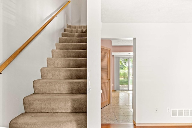 23 Fetzer Dr Unit 3, Bloomington, IL 61704 - stairway with tile patterned flooring