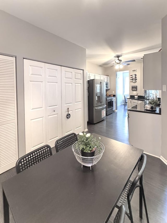 3125 Anton Dr Unit 3125, Aurora, IL 60504 - dining room featuring dark wood-style floors and a ceiling fan