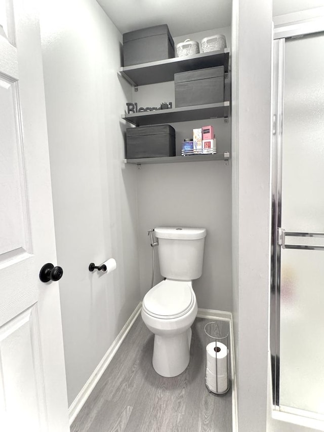 3125 Anton Dr Unit 3125, Aurora, IL 60504 - bathroom with wood finished floors and a shower stall
