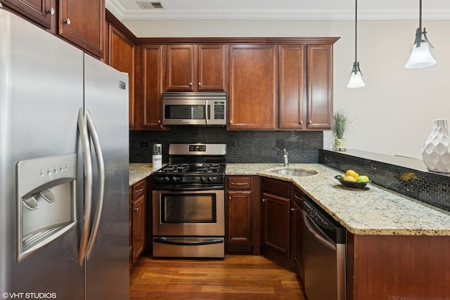 4507 N Paulina St Unit 2S, Chicago, IL 60640 - kitchen with stainless steel appliances, crown molding, dark wood-type flooring, tasteful backsplash, and light stone countertops