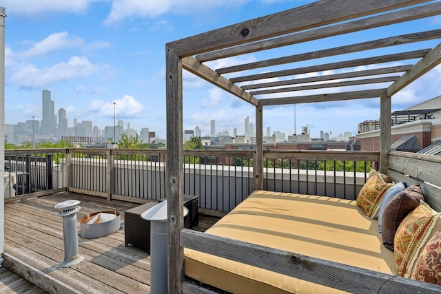 743 W 15th St, Chicago, IL 60607 - wooden terrace featuring a skyline view and a pergola