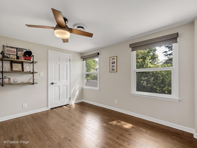19 Indian Dr, Clarendon Hills, IL 60514 - unfurnished bedroom with wood finished floors and ceiling fan