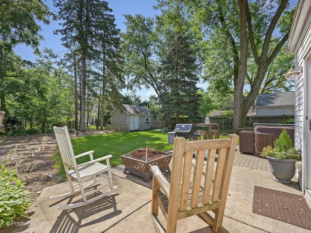 19 Indian Dr, Clarendon Hills, IL 60514 - fenced backyard featuring a hot tub, a patio area, a fire pit, and an outbuilding