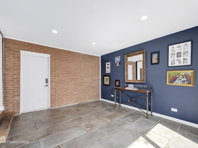 19 Indian Dr, Clarendon Hills, IL 60514 - foyer featuring brick wall and recessed lighting