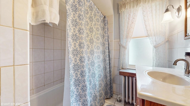 442 Hannah Ave, Forest Park, IL 60130 - bathroom featuring radiator, shower / tub combo with curtain, vanity, and tile patterned flooring