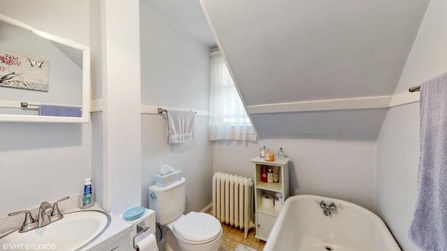 442 Hannah Ave, Forest Park, IL 60130 - bathroom with radiator, a soaking tub, vanity, and vaulted ceiling