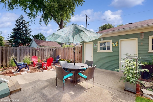 442 Hannah Ave, Forest Park, IL 60130 - view of patio featuring outdoor dining space and a fire pit