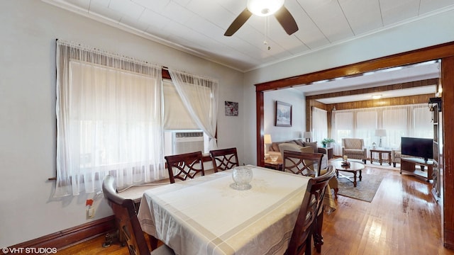 442 Hannah Ave, Forest Park, IL 60130 - dining space featuring ornamental molding, cooling unit, wood finished floors, and a ceiling fan