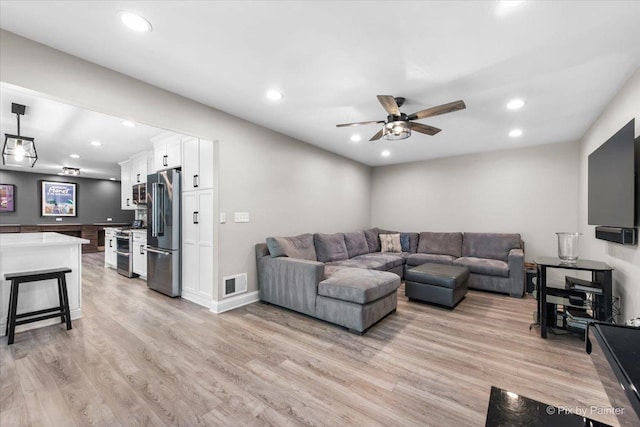 746 Parker Ct, Geneva, IL 60134 - living room with light wood-style floors, ceiling fan, and recessed lighting