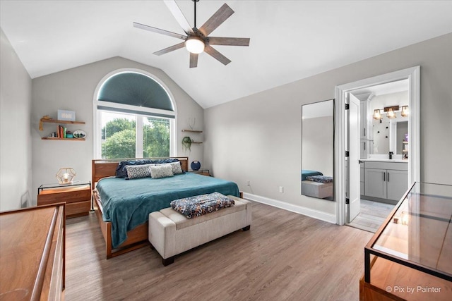 746 Parker Ct, Geneva, IL 60134 - bedroom with light wood-type flooring, lofted ceiling, connected bathroom, and ceiling fan
