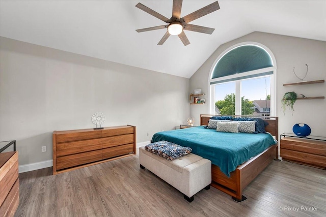 746 Parker Ct, Geneva, IL 60134 - bedroom with vaulted ceiling, wood finished floors, and ceiling fan