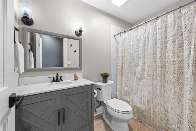 746 Parker Ct, Geneva, IL 60134 - full bath with vanity, wood finished floors, and a shower with shower curtain