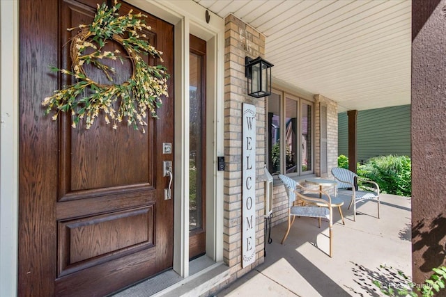746 Parker Ct, Geneva, IL 60134 - view of exterior entry with covered porch and brick siding