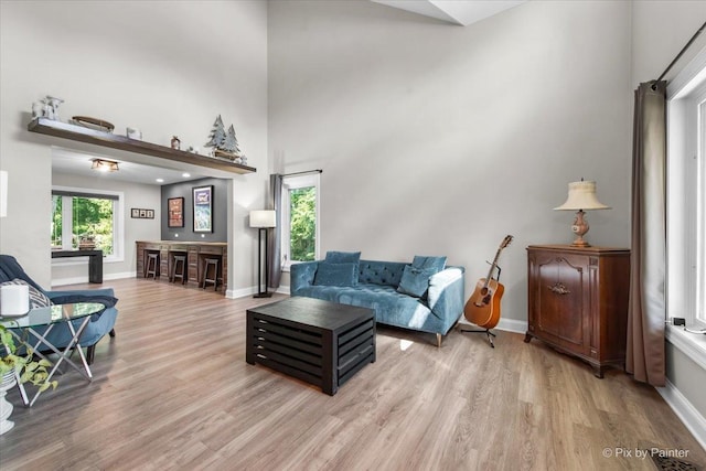 746 Parker Ct, Geneva, IL 60134 - living area featuring light wood-style floors and a towering ceiling