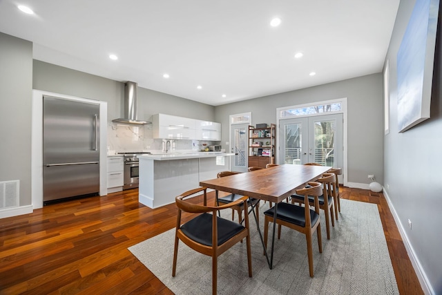 1123 W 19th St, Chicago, IL 60608 - dining room with french doors, dark wood-style flooring, and recessed lighting