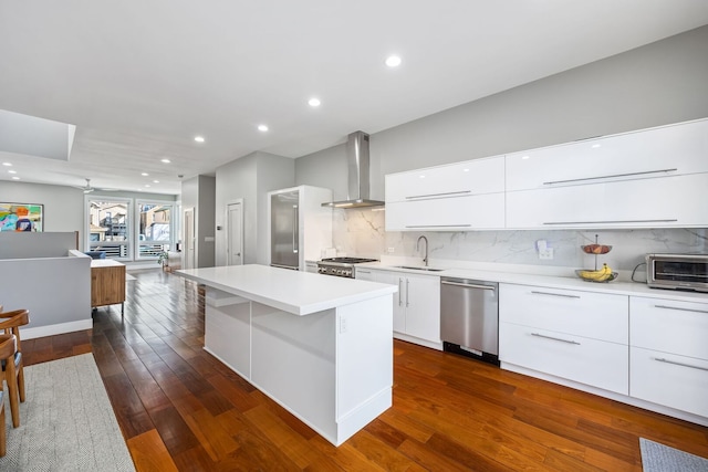 1123 W 19th St, Chicago, IL 60608 - kitchen with wall chimney range hood, modern cabinets, stainless steel dishwasher, a center island, and white cabinetry