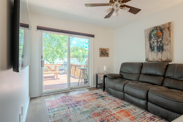 712 Fremont St, Bloomington, IL 61701 - living room featuring ceiling fan and wood finished floors