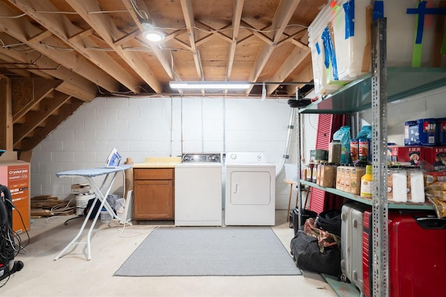 712 Fremont St, Bloomington, IL 61701 - unfinished basement with washer and dryer and concrete block wall