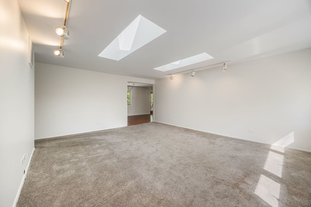 808 S Cedarcrest Dr, Schaumburg, IL 60193 - empty room featuring a skylight and carpet floors