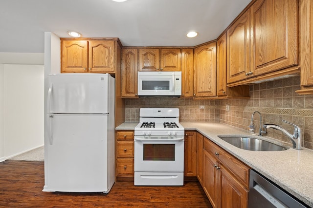 808 S Cedarcrest Dr, Schaumburg, IL 60193 - kitchen with white appliances, brown cabinetry, light countertops, decorative backsplash, and recessed lighting