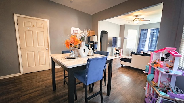 7250 S Morgan St, Chicago, IL 60621 - dining space with a ceiling fan, dark wood-style floors, and arched walkways